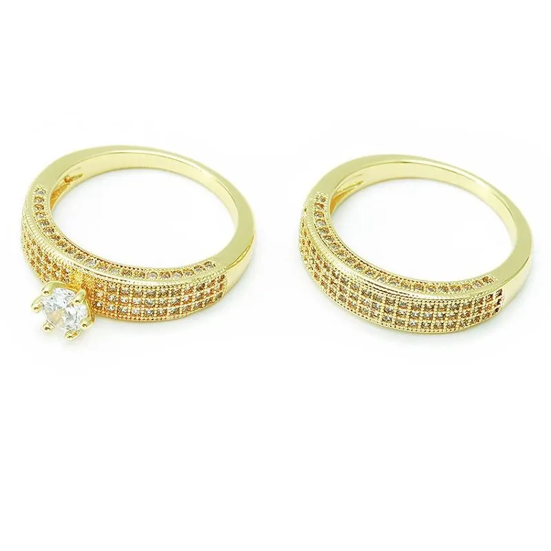 Unikalus paauksuotas vestuvinių žiedų rinkinys